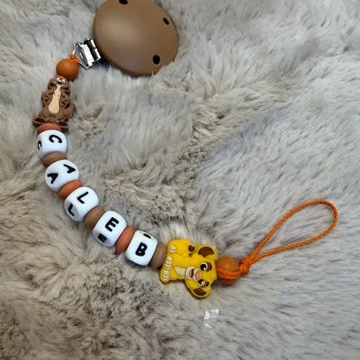 Attache tétine roi lion 